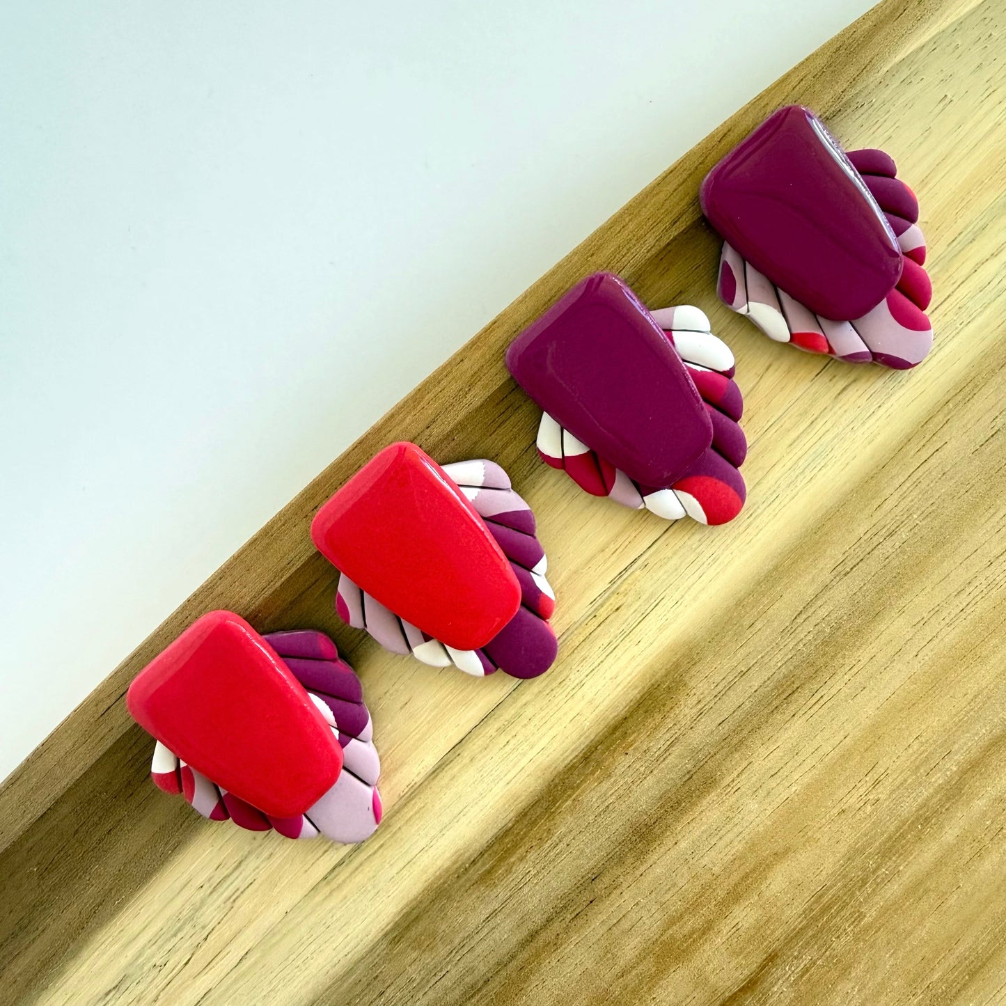 Main Character magenta extra statement studs