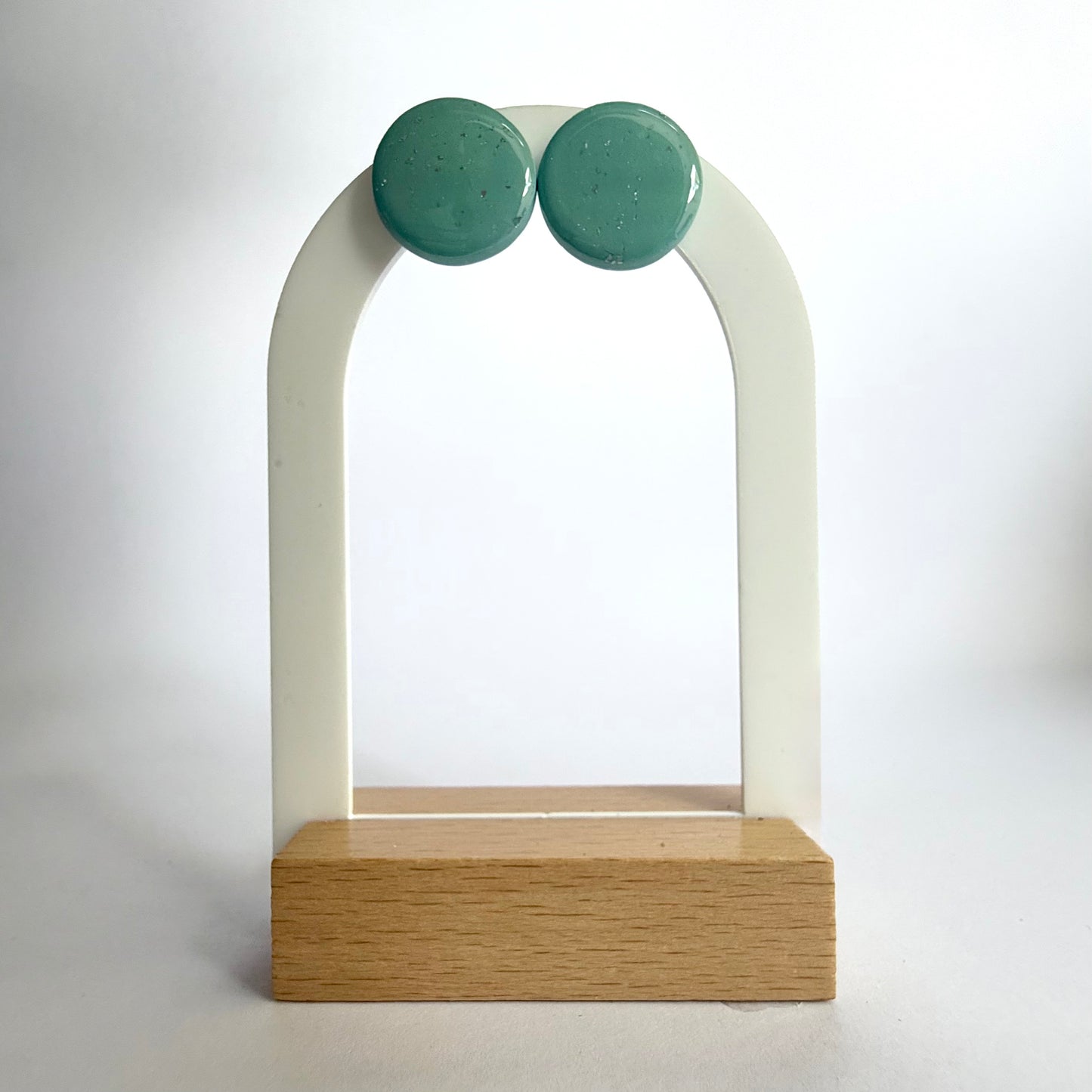 Jazzed statement studs with silver leaf accent