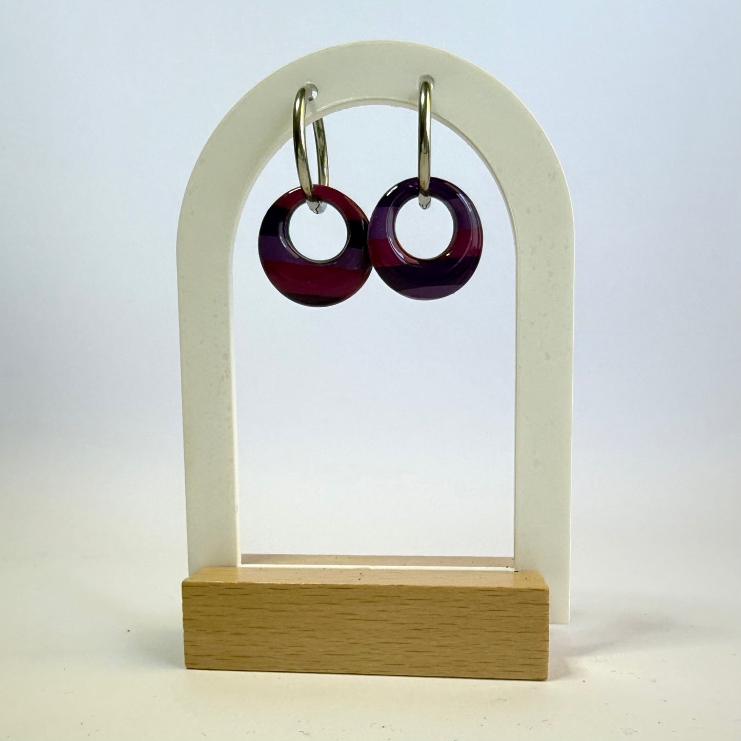 We're All Mad hoop dangles