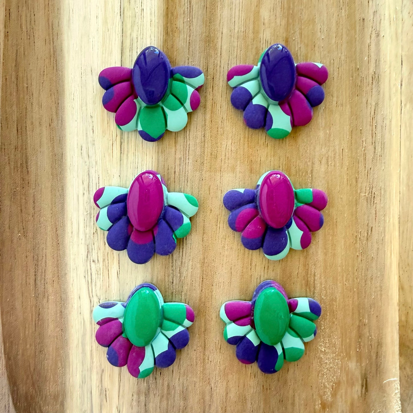 Joy Edit green extra statement studs