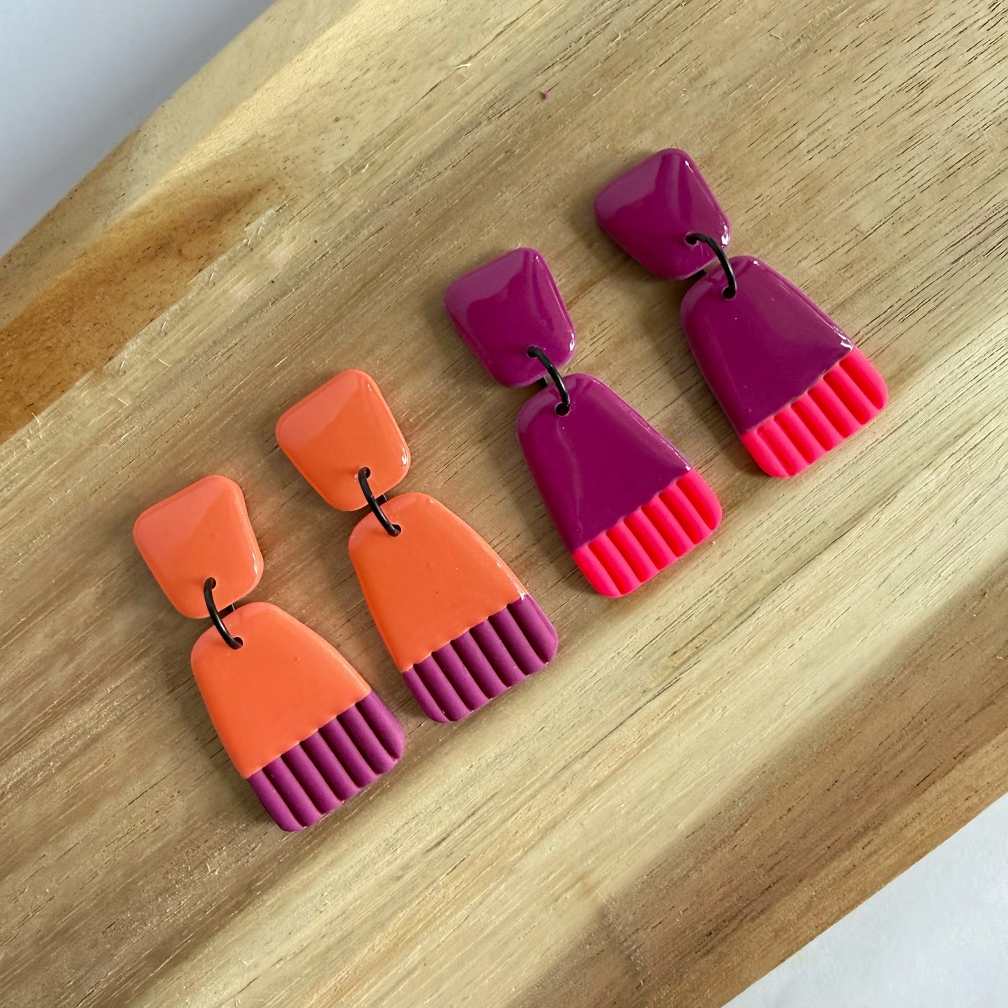 Bold Move magenta pink dangles