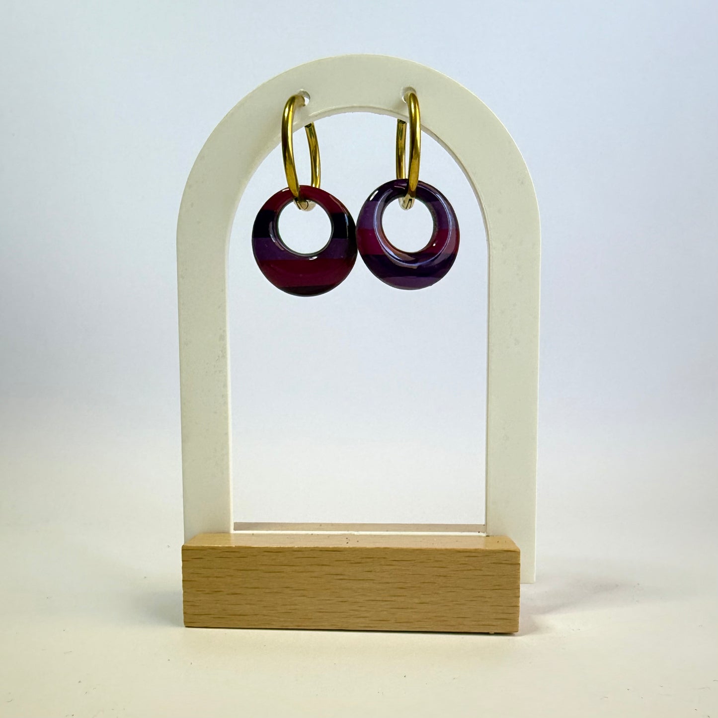 We're All Mad hoop dangles