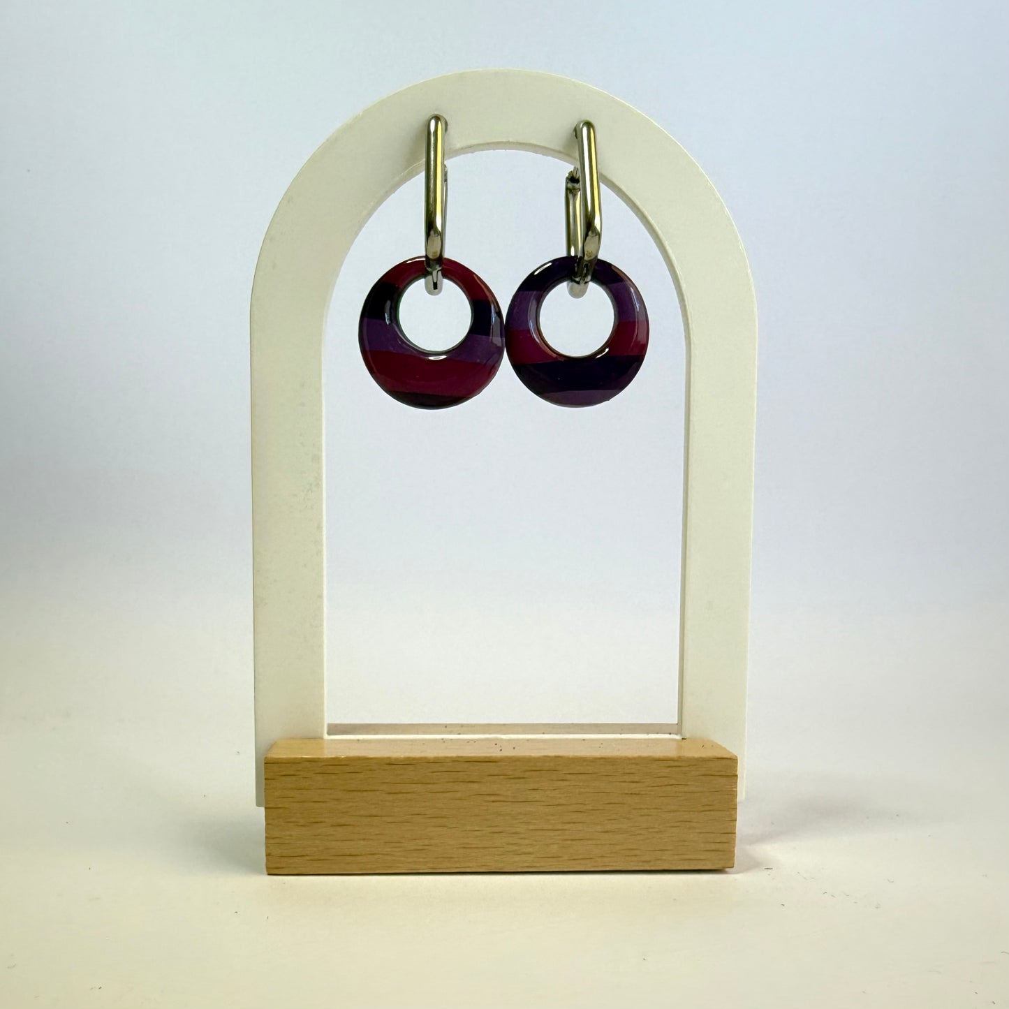We're All Mad hoop dangles