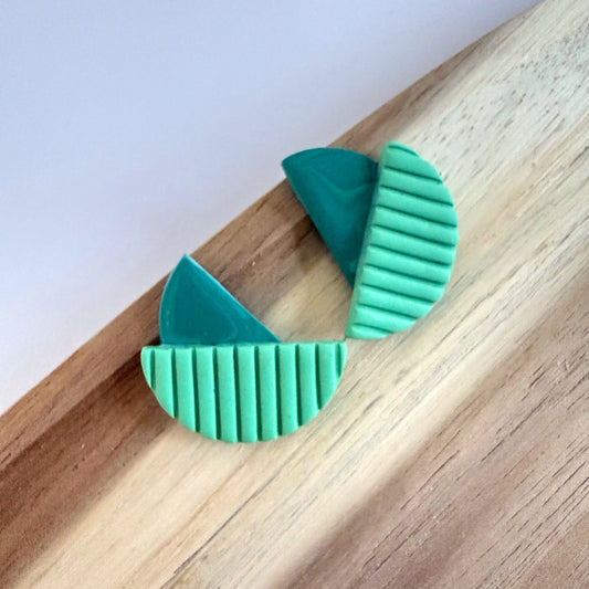 Outside In green extra statement studs