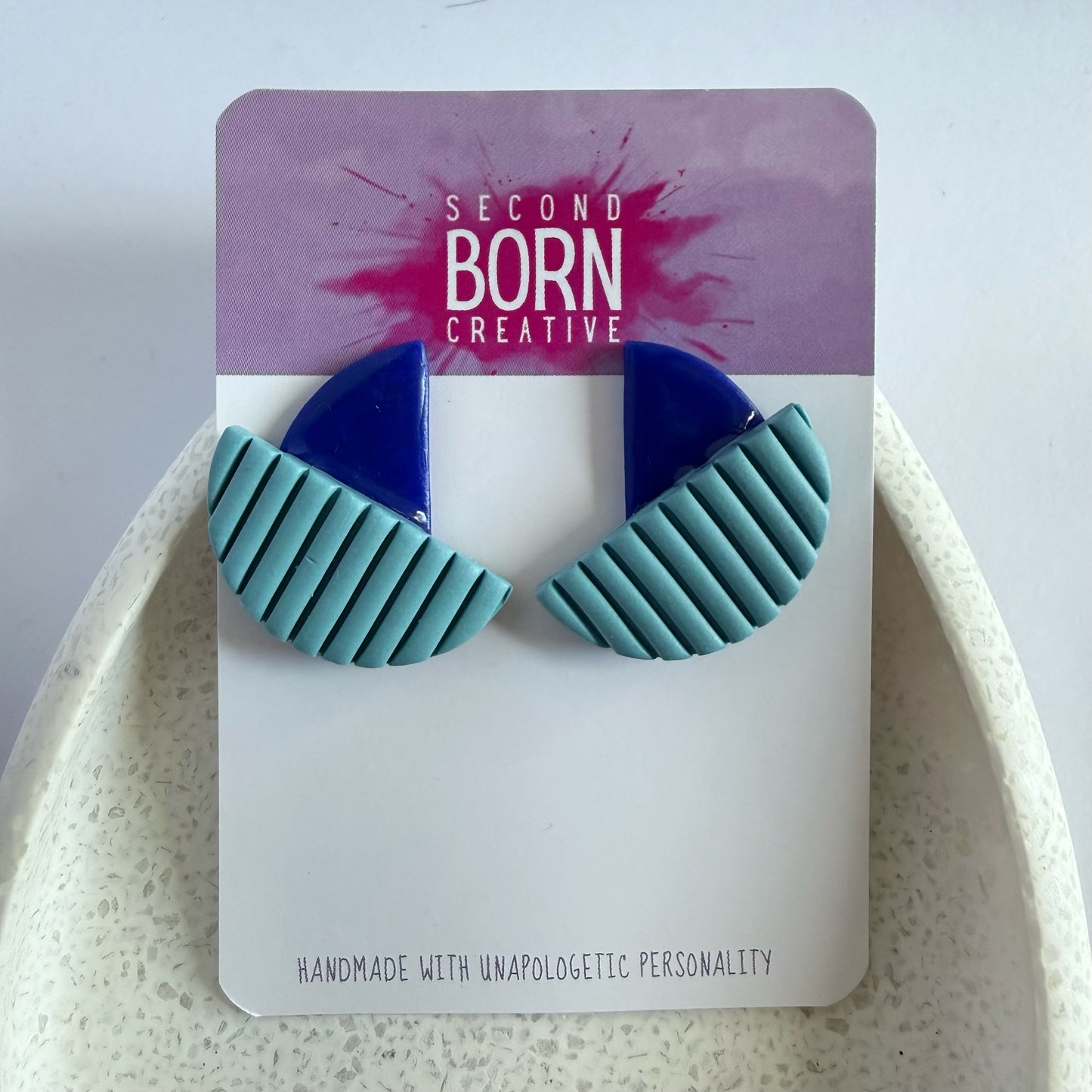 Outside In blue extra statement studs