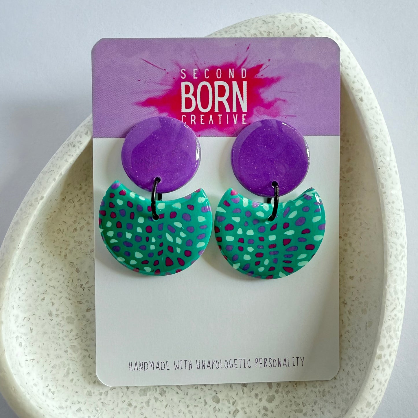 Spot’s Happening purple stud dangles