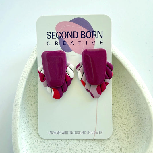 Main Character magenta extra statement studs