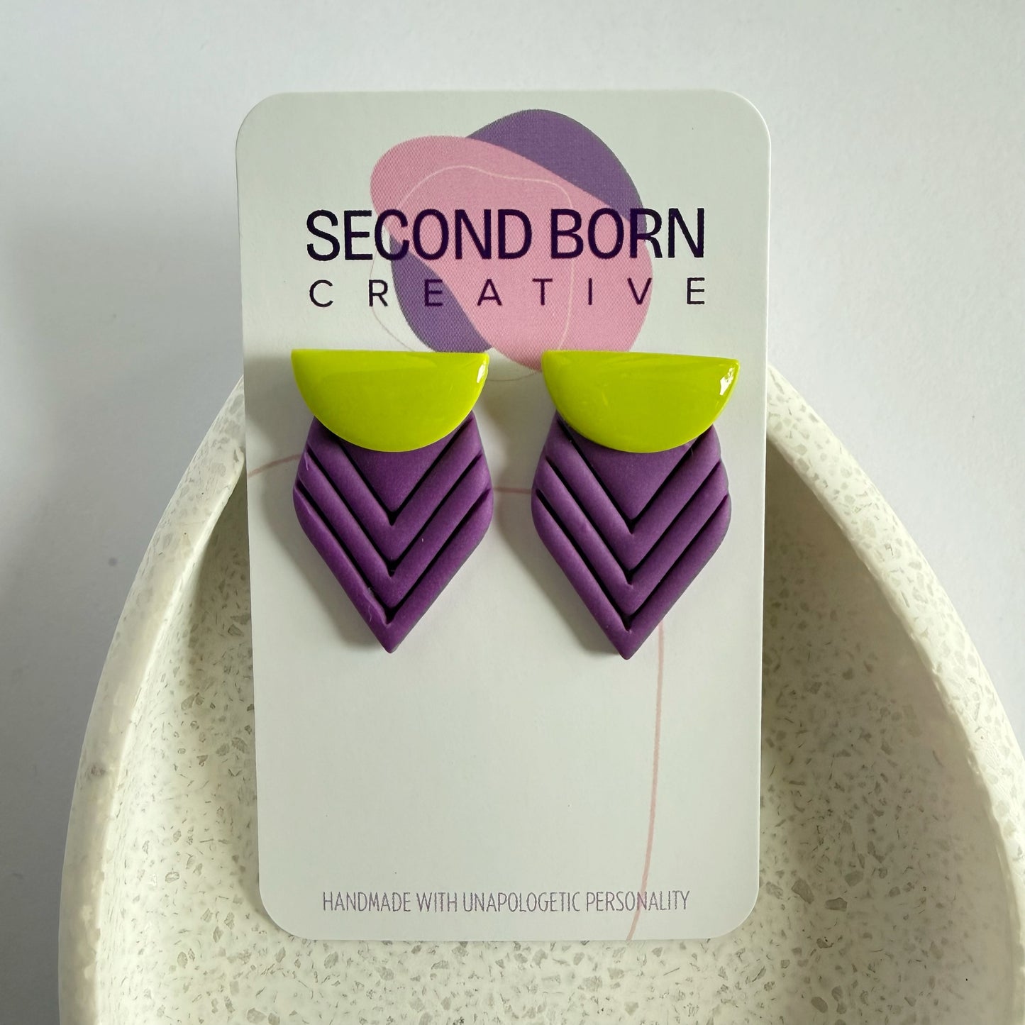 Offbeat extra statement studs