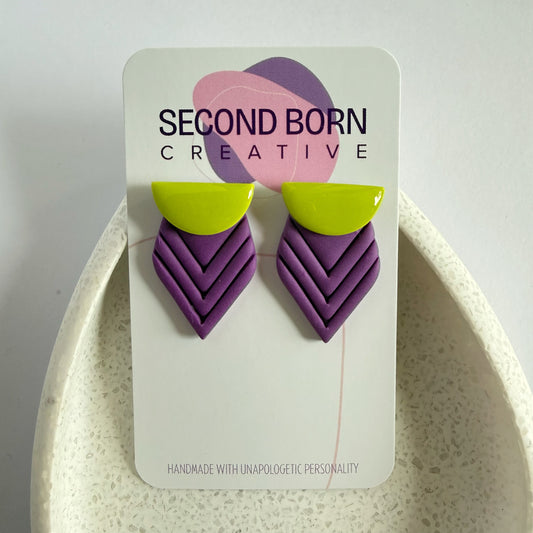 Offbeat extra statement studs