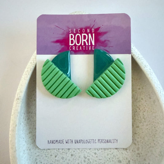 Outside In green extra statement studs