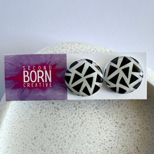 Mono-charm statement studs