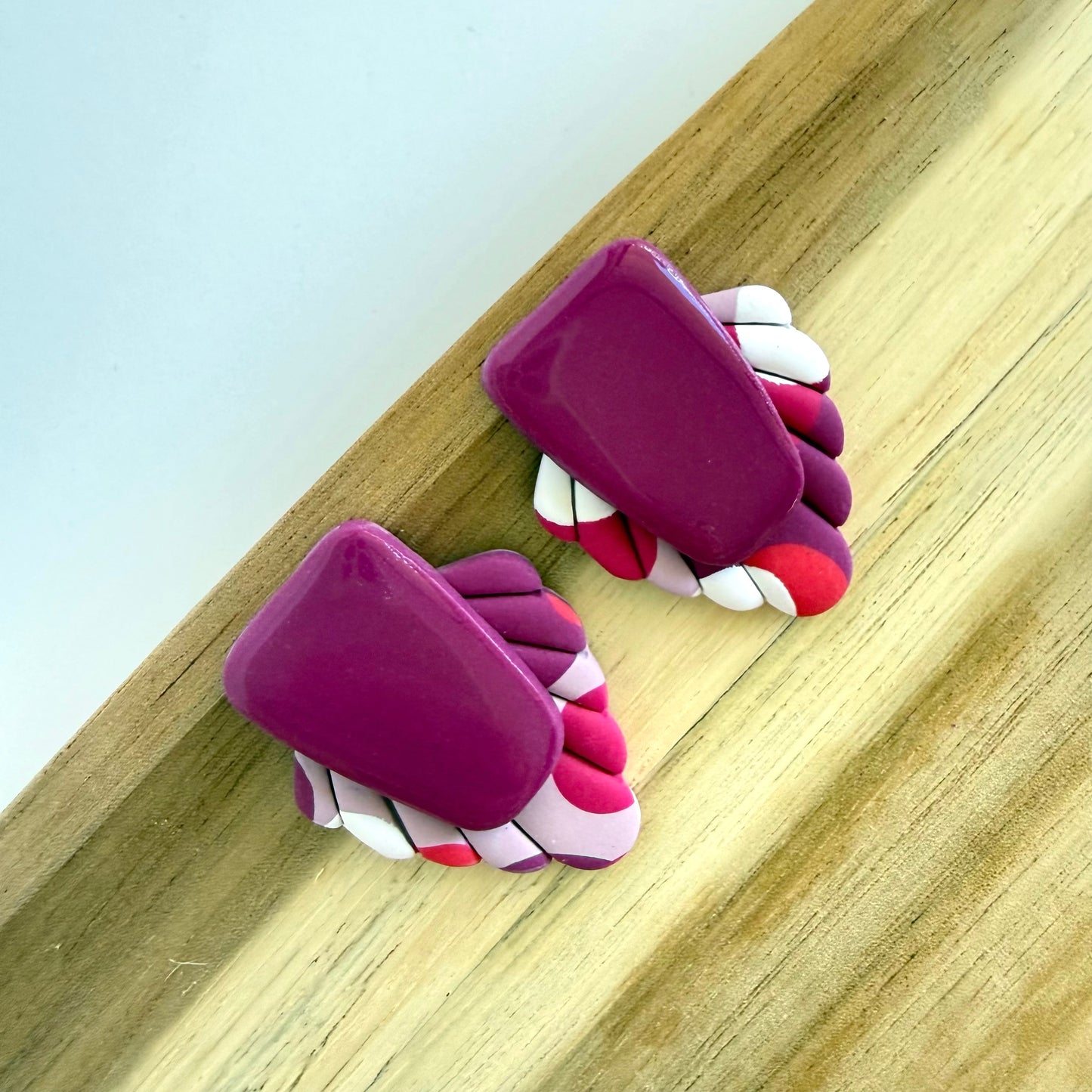 Main Character magenta extra statement studs