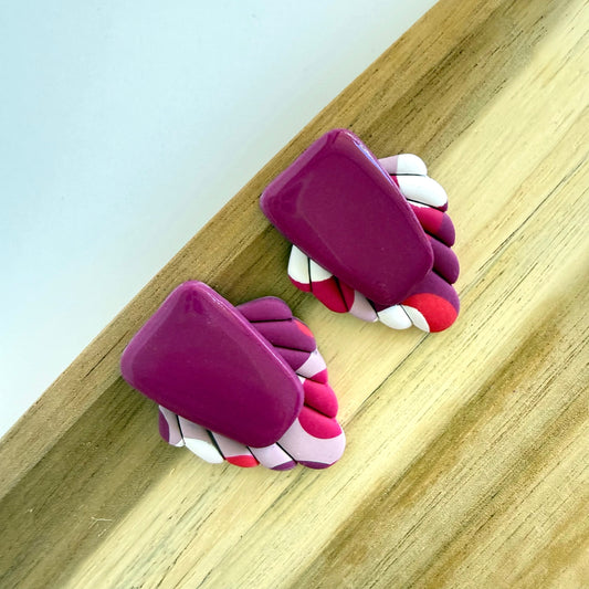 Main Character magenta extra statement studs