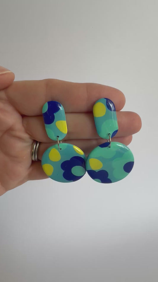 Fresh as a Daisy pill dangles