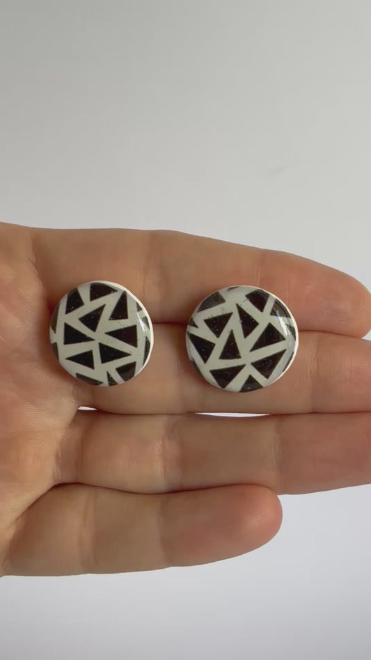 Mono-charm statement studs